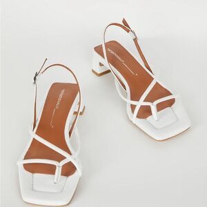 Anthropologie Intentionally Blank Fifi Slingback
Block Heels. White 10 NWB